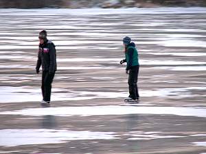 skating on frozen lake